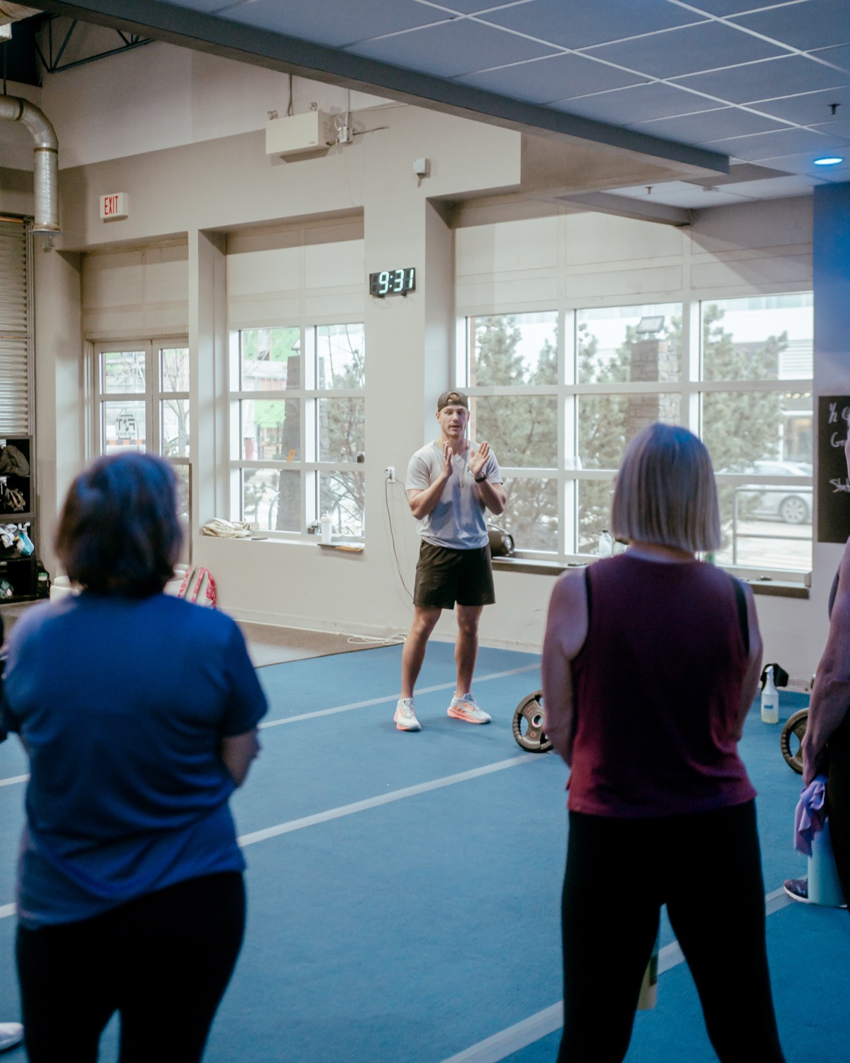 A full class on the training floor at Fit Training